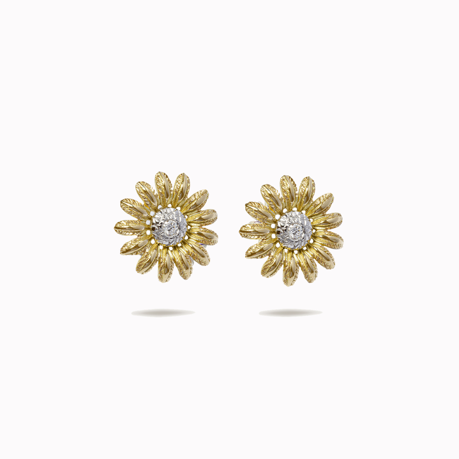 Sunflower earrings in 18kt set with diamonds. Victor Azzopardi